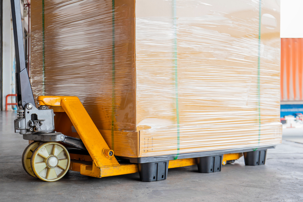 hand pallet truck with cargo pallet shipment